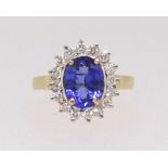 A modern tanzanite and diamond ring, the tanzanite approx 1.80cts, with original receipt 2018,