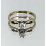 A 9ct small diamond solitaire ring, ring size J/K.