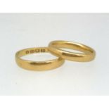 Two 22ct wedding bands, approx 6.90gms (2).