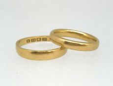 Two 22ct wedding bands, approx 6.90gms (2).