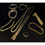 A collection of various 9ct gold chains and bracelets, approx 137gms, together with a yellow metal