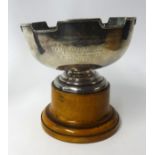A Geo V silver presentation bowl with inscription, approx 15.95oz on wood socle base together with