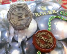 Rolex, a ladies stainless steel Datejust wristwatch with diamond dot dial and diamond bezel, with