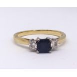 A 18ct sapphire and diamond three stone ring.