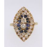 An 18ct yellow gold sapphire and diamond oval shape ring, the setting approx 23mm x 14mm.