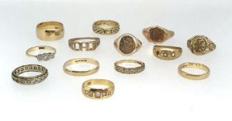 Collection of thirteen mainly 9ct gold dress rings (eleven 9ct, 39gms and two 18ct, 6.4gms)