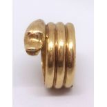 A 22ct yellow gold 'snake' ring, approx 12.60 gms.