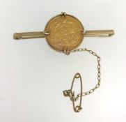 A Geo. V half sovereign 1912, mounted on a bar brooch, approx 7.50gms.