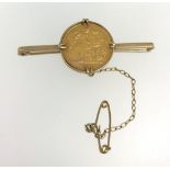 A Geo. V half sovereign 1912, mounted on a bar brooch, approx 7.50gms.