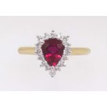 An 18ct fine ruby and diamond pear shaped cluster ring, the ruby approx 1.39 cts, the 16 diamonds