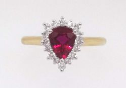 An 18ct fine ruby and diamond pear shaped cluster ring, the ruby approx 1.39 cts, the 16 diamonds