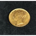 Victoria, 1884 gold sovereign.