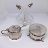 A silver mustard pot with spoon and blue glass liner, a silver ring box, and a double glass and