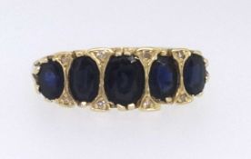 An 18ct sapphire and diamond five stone ring, ring size O.