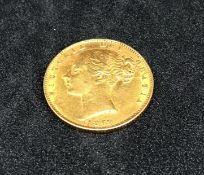 Victoria, 1869 shield back gold sovereign.