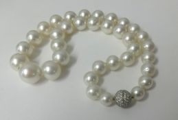 A South Sea pearl necklace, graduating in size, measuring approx. 46cm length.