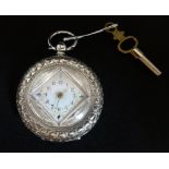 A ladies silver pretty open face fob watch, with key.