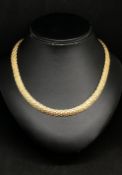 A 14k yellow gold necklace, approx 35.90gms.