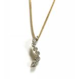 A 9ct pendant and chain, the wavy line pendant set with brilliant cut diamonds, together with a copy