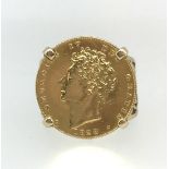 A Geo. IV 1828 half sovereign mounted in a ring, 9.10gms.