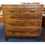 A large 19th Century mahogany chest fitted with two short and three long drawers on bracket feet,