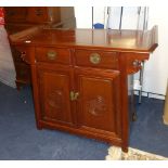 A Chinese style rosewood 'Altar' cabinet