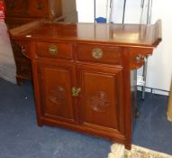 A Chinese style rosewood 'Altar' cabinet