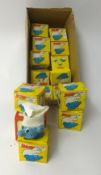 A collection of small Smurf novelty egg cups and cosies, boxed (14).