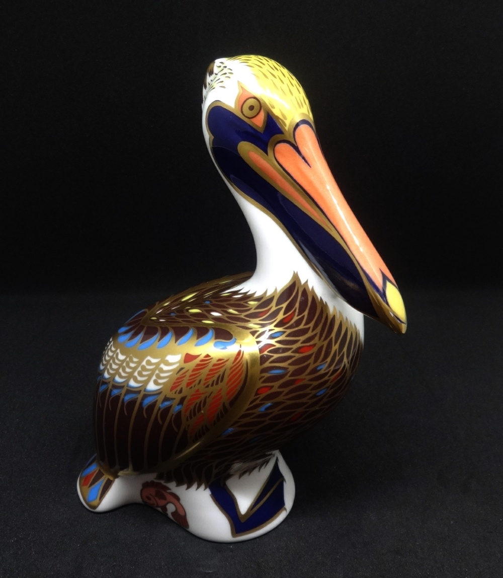 A boxed Royal Crown Derby paperweight 'Brown Pelican', gold stopper, dated 1998.