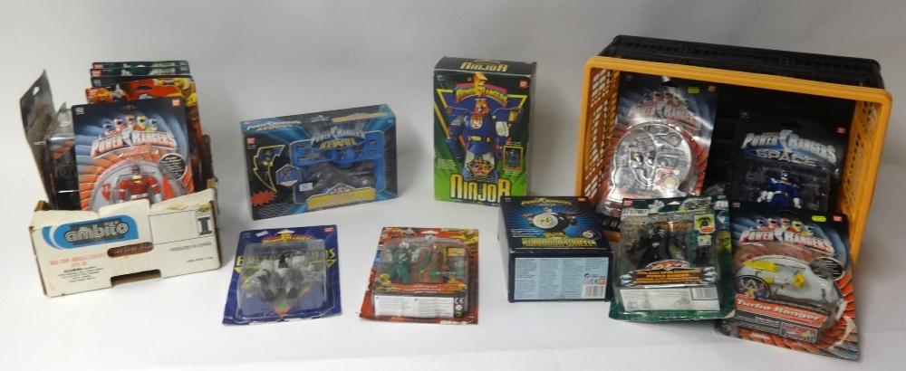 A collection of Power Rangers boxed and packaged action figures.