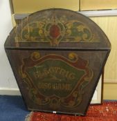 An antique wood sign inscribed 'Electric Disc Game', hand painted, height 102cm, width 101cm.