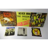 A small collection of old vinyl punk records including Sex Pistols etc.