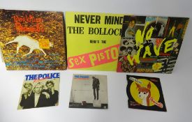 A small collection of old vinyl punk records including Sex Pistols etc.