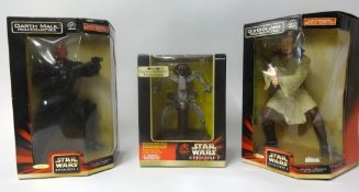 A quantity of Star Wars action figures and collectables, boxed and packaged.