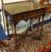 An old reproduction of a 17th Century side table with baluster turned legs and cross stretchers,