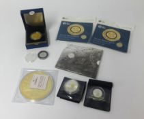 Various commemorative coins including Royal Mint Britannia Gairsopa, American dollar, Westminster