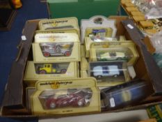 A collection of model cars including Yesteryear.