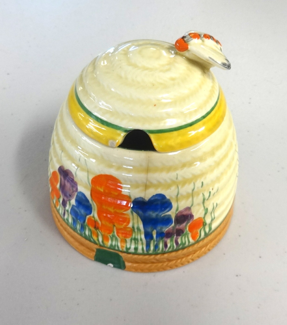 Clarice Cliff, jam pot and cover (the cover is damaged)