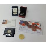 A collection of various commemorative coins including some silver, Westminster Mint, Golden