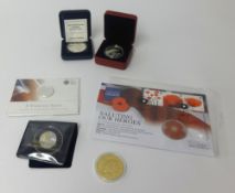 A collection of various commemorative coins including some silver, Westminster Mint, Golden