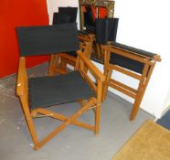 Four folding modern Directors chairs.