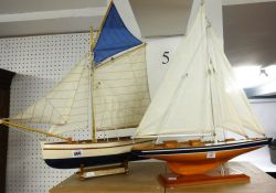 Two modern model boats.