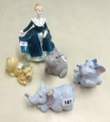 A collection of various Nao animal ornaments and a Royal Doulton figure 'Janine'.