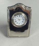 Concorde, a small silver desk clock, boxed.