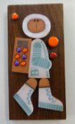 Muramic, Hornsea, handcrafted wall decoration 'Spaceman' designed by John Clappison, 20cm x 10cm.