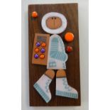 Muramic, Hornsea, handcrafted wall decoration 'Spaceman' designed by John Clappison, 20cm x 10cm.