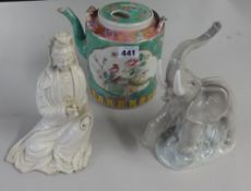 A Nao porcelain elephant, Chinese porcelain teapot and a Chinese white porcelain figure (badly