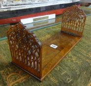 A Victorian mahogany book slide with fret work carving