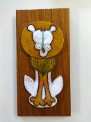 Muramic, Hornsea, handcrafted wall decoration 'Lion' designed by John Clappison, 20cm x 10cm.