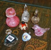 A porcelain scent bottle with silver cap and glass scent bottles etc.
